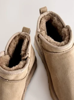 Neutraal taupe suède - Waterafstotende enkellaarzen van imitatiebont
