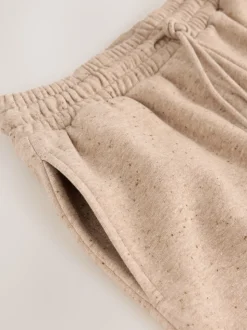 Neutrale Neppy textuur - Essential Wide Leg Jersey Joggers