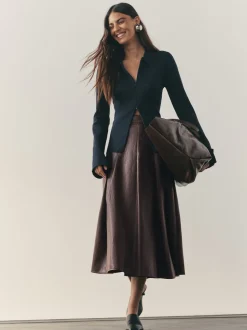 Nothing Ordinary Faux Leather Wrap Midi Kilt Skirt