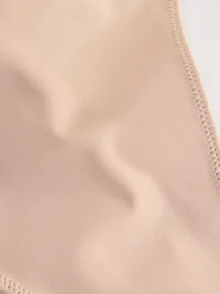 Praline nude - Ingeklapte body met meerdere bandjes en rugleuning