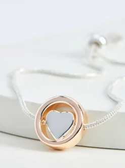 Roségoudkleurig/zilverkleurig - Doorgetrokken armband met hartjes
