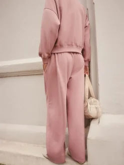 Roze - self. joggingbroek met wijde pijpen