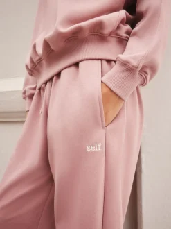 Roze - self. joggingbroek met wijde pijpen