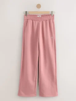 Roze - self. joggingbroek met wijde pijpen
