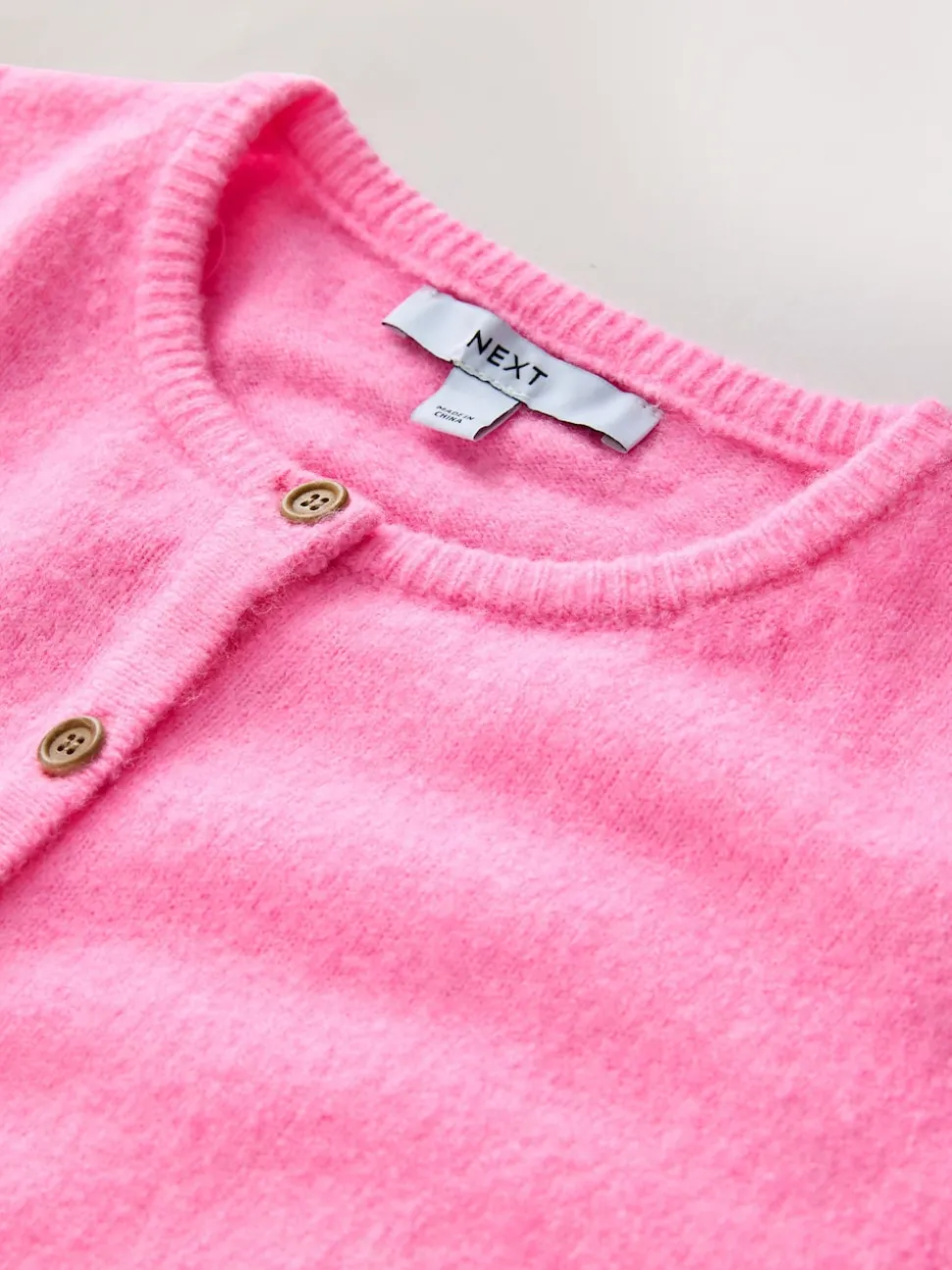Roze bloemetjes - Gebreid vest met ronde hals
