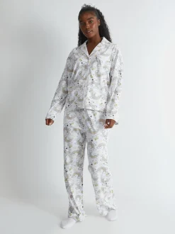 Skinnydip Peanuts x Skinnydip Snoopy Rainbow Print Pyjama Set in Ecru