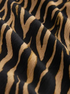 Tijgerprint - Maxirok met getailleerde taille