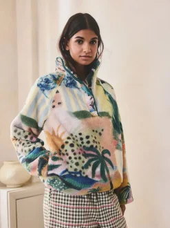 Tropisch oranje tafereel - Borg fleece top met print