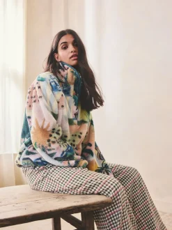 Tropisch oranje tafereel - Borg fleece top met print