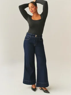 Wassing - Zandloperjeans met stretchy, hoge taille en wijde pijpen