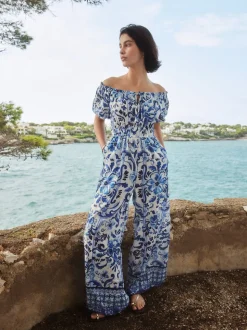 Wit/zwart - Jumpsuit met blote schouder