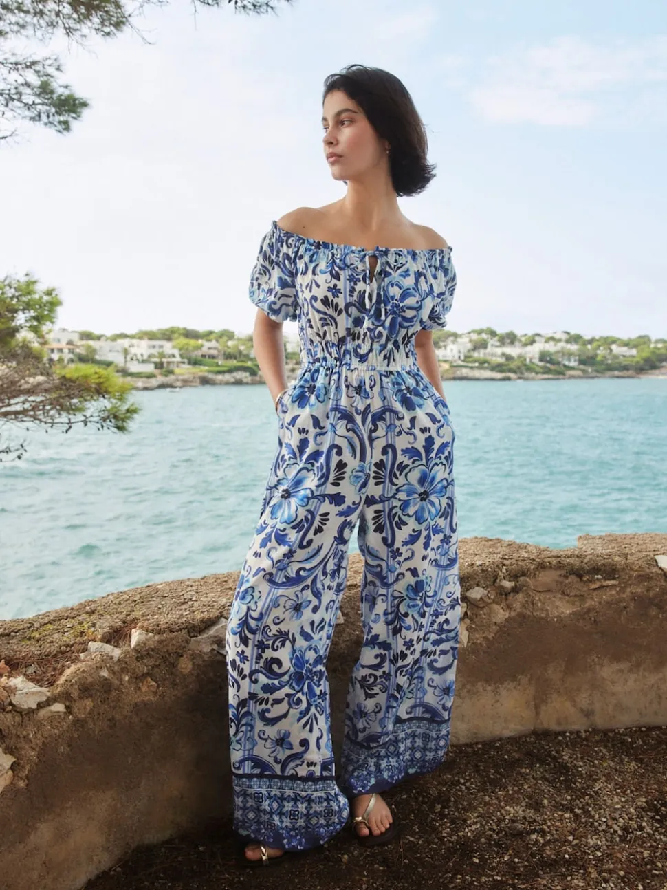 Wit/zwart - Jumpsuit met blote schouder