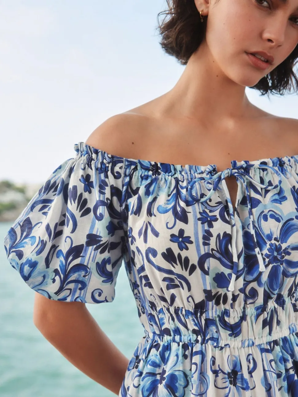 Wit/zwart - Jumpsuit met blote schouder
