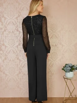 Yumi - Jumpsuit met lovertjes en lange mouwen
