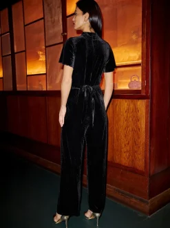 Yumi Velvet Jumpsuit With Twist Neckline And Buckle Belt