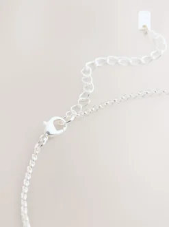 Zilverkleurig - Ketting met hangertje van vereende ringen