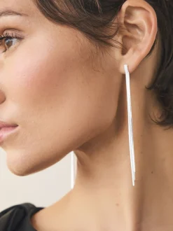 Zilverkleurig - Oorbellen met glinsterende hangers