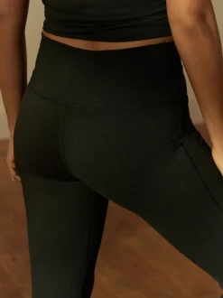 Zwart - Actieve flared legging met tailleoverslag