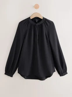 Zwart - Blouse met V-hals en lange mouwen