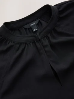 Zwart - Blouse met V-hals en lange mouwen