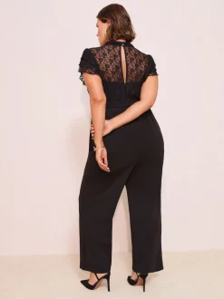 Zwart - Friends Like These jumpsuit van kant en scubamix met ruches aan de mouwen