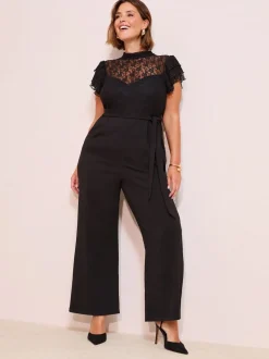 Zwart - Friends Like These jumpsuit van kant en scubamix met ruches aan de mouwen