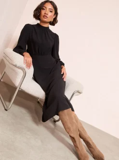 Zwart - Friends Like These Midi-jurk met opstaande kraag en lange mouwen en strikdetail