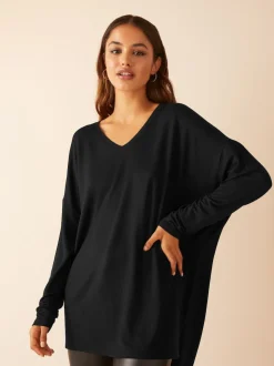 Zwart - Friends Like These - Zachte jersey tuniektop met V-hals en lange mouwen