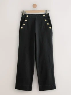 Zwart - Jeans met wijde pijpen en gouden knopen aan de voorkant