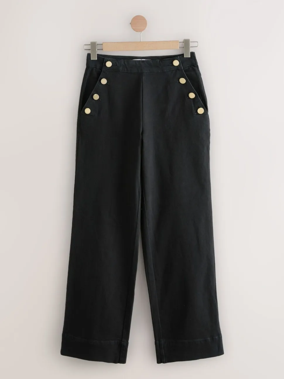 Zwart - Jeans met wijde pijpen en gouden knopen aan de voorkant