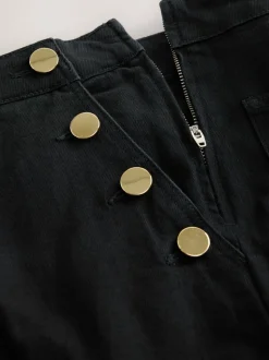 Zwart - Jeans met wijde pijpen en gouden knopen aan de voorkant