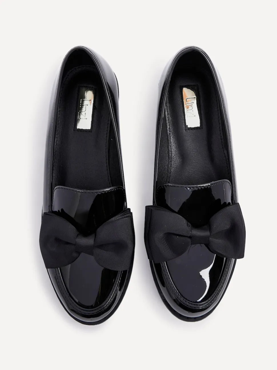 Zwart - Linzi Cathy loafers met plateauzool en grote strik