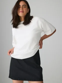 Zwart - Mini denim rok met zandloper model