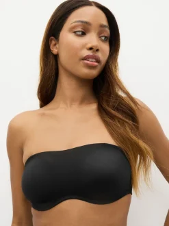 Zwart - Minimaliserende strapless bandeaubeha zonder vulling in cupmaat DD+