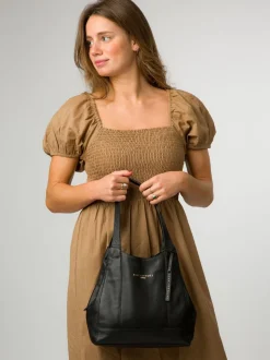 Zwart - Pure Luxuries London Colette leren handtas