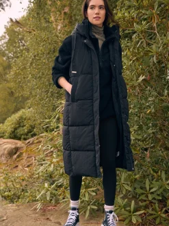 Zwart - Regenbestendige bodywarmer met capuchon en gebreide kraag
