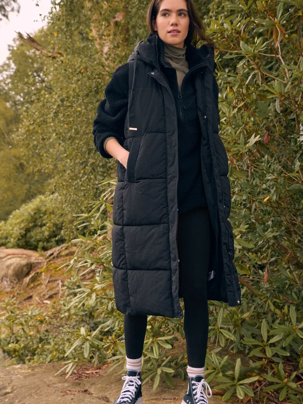 Zwart - Regenbestendige bodywarmer met capuchon en gebreide kraag