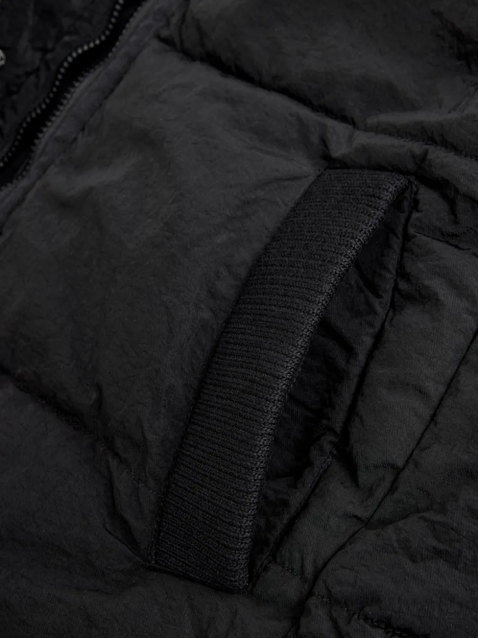Zwart - Regenbestendige bodywarmer met capuchon en gebreide kraag