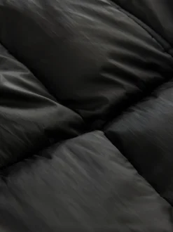 Zwart - Regenbestendige gewatteerde lange jas