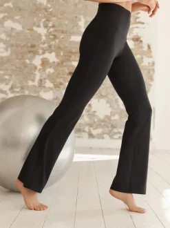 Zwart - Superzachte Dry Tech yogasportleggings met uitlopende pijpen