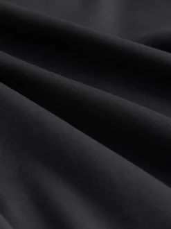 Zwart - Superzachte Dry Tech yogasportleggings met uitlopende pijpen