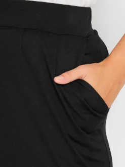 Zwart - Yours Curve - Jersey stretchjoggingbroek met dubbele bandplooi