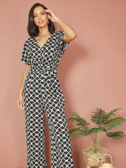 Zwart - Yumi jumpsuit met overslag en geometrische print