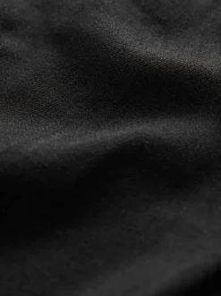 Zwart - Zandloper superzachte jeans met uitlopende pijpen