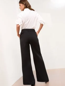 Zwart met riem - Wijduitlopende Lipsy broek