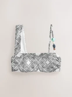 Zwart/crème met aztekenprint - Asymmetrische bikinitop met kralen