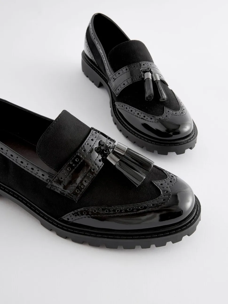 Zwarte mix - Loafers met dikke zool met profiel en kwastjes