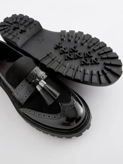 Zwarte mix - Loafers met dikke zool met profiel en kwastjes