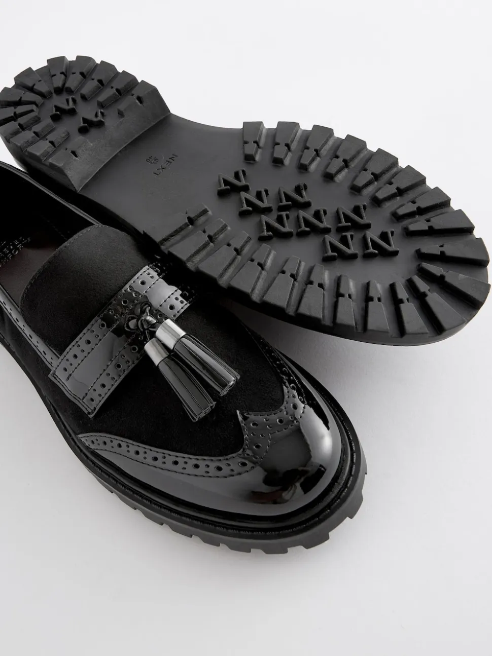 Zwarte mix - Loafers met dikke zool met profiel en kwastjes
