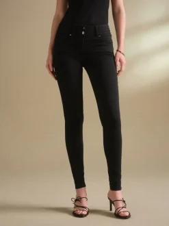Zwarte wassing - Skinny jeans met verlengings- en afslankeffect